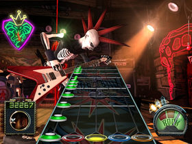 Kid smashes 80 Guitar Hero controllers, world record