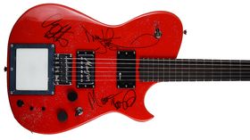 Guitar signed by Muse top prize in charity auction
