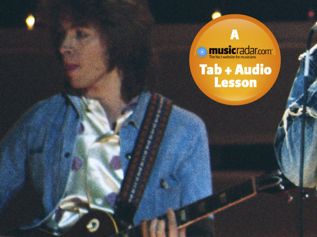 Taylor playing live with the Stones in 1973