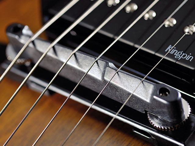 Godin 5th Avenue CW Kingpin The high two-piece bridge will necessitate some adjustment to your playing style.