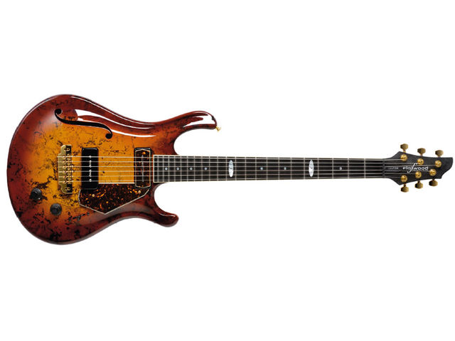 Flaxwood CC-H CC Custom Flaxwood itself is a wood-based composite - a man-made tonewood that eliminates the grain structure of the wood.