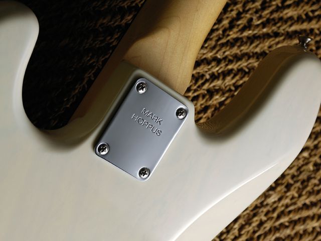 The custom neckplate - bearing the Blink-182 star's name - is as utilitarian as the rest of the bass.