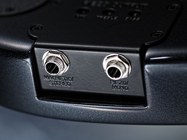 Music Man JPXI Dual outputs enable you to route the piezo and magnetic pickups separately.