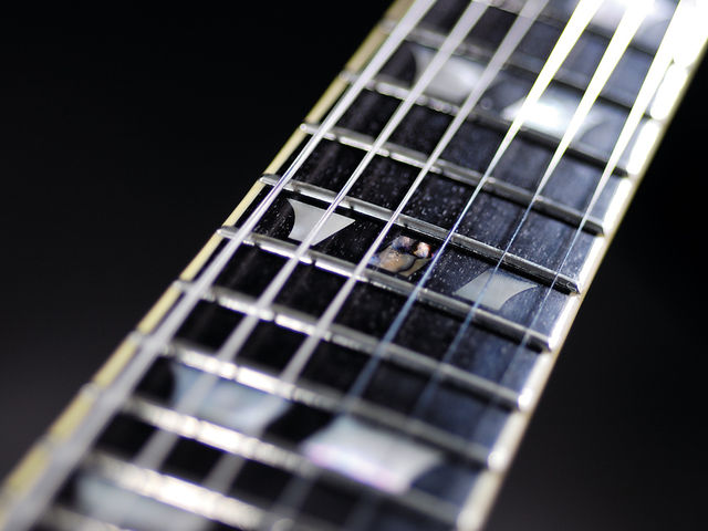 Schecter S-1 Custom Mother-of-pearl split crown inlays.