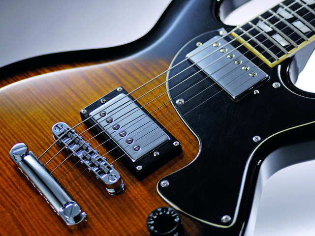 Schecter S-1 Custom The S-1 Custom is similar in design to the Les Paul Junior.