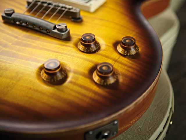 The dark sunburst top is classic and alluring.