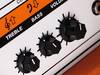 Turn your bass pot down as you get louder
