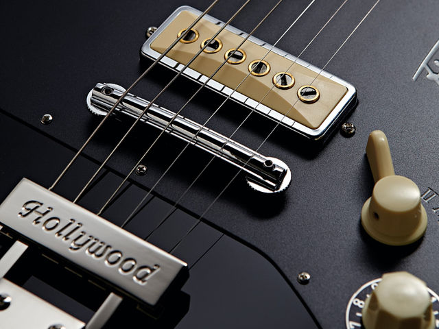 The vintage-correct bridge is a nice touch, but could cause intonation issues.