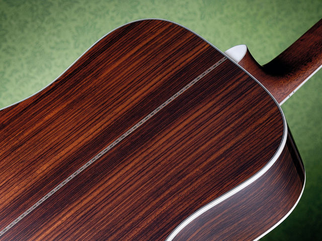 Sigma DR-41 …while the back and sides are laminated Indian rosewood.