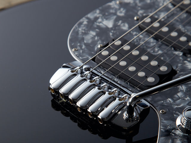 The Taylor Tremolo vibrato is a triumph of form and function.