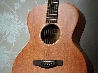 The Atkin AA AM Special's narrow pearl soundhole ring tops off a subtle aesthetic approach.