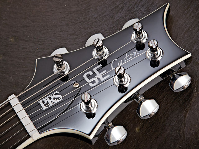 PRS's high-quality enclosed locking tuners aid tuning stability.