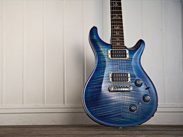 PRS P22 The faded finish almost looks aged in the way the plain maple pokes through the blue stain