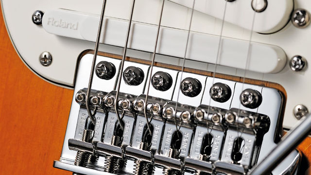 Roland VG Pickup Between the bridge pickup and the vibrato is a GK-style hexaphonic pickup, which passes the string information into the digital realm to voice the Roland COSM technology