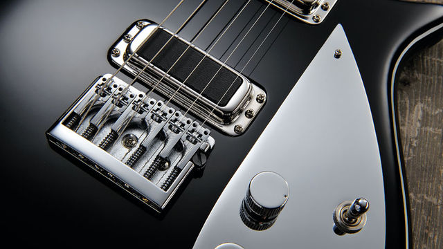 Bridge A flat-mount Schaller bridge ensures better tuning stability than vintage Rickys