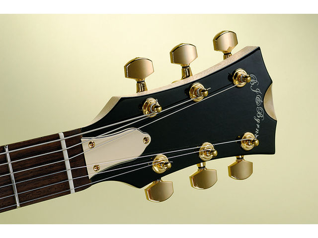 The headstock front is lacquered to match the body and topped with Gotoh tuners. The headstock front is lacquered to match the body and topped with Gotoh tuners.