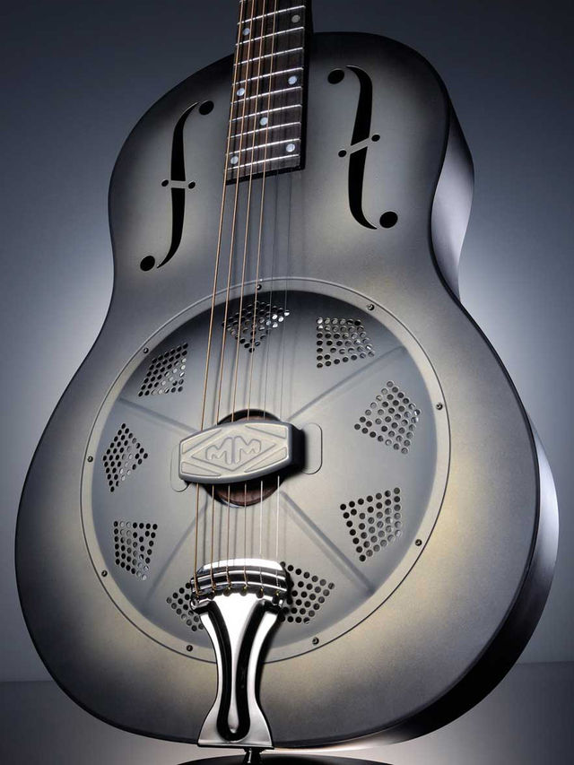 Michael Messer Blues Under the 'colander' front of this guitar is the aluminium resonator cone