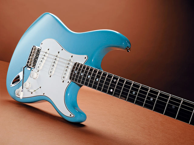 Updates for this model include the white three-ply pickguard