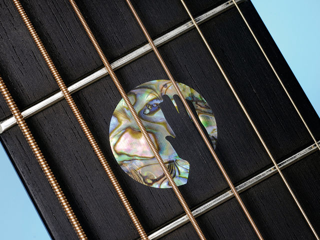 The fifth fret inlay recalls Martyn's classic Solid Air LP