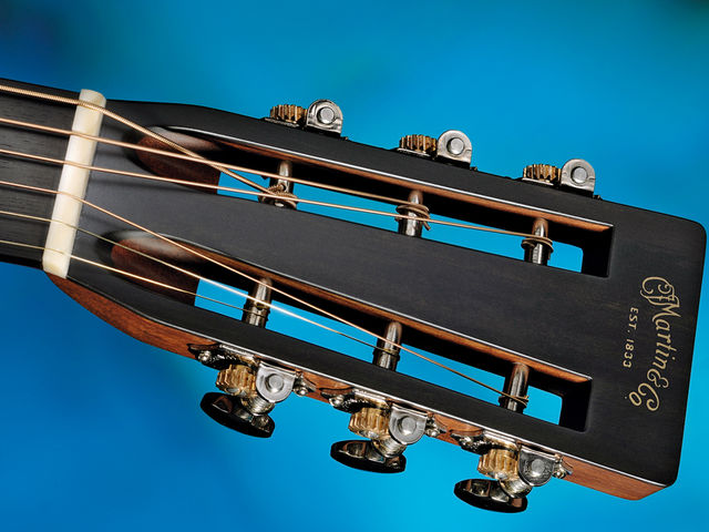 Side-mounted Waverly 4063 tuners adorn the slotted headstock
