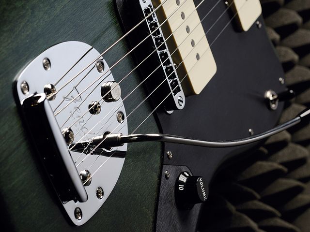 The Thurston Moore Jazzmaster sports a Gibson-style adjust-o-matic bridge