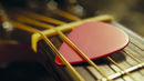 Playing acoustic guitar: plectrum technique