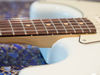 Slim-profile D-shaped maple neck with dark rosewood slab fingerboard