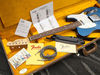 Includes vintage '64 Tele strap, cable and cloth; vintage wiring kit, '60s Tele information kit, bridge cover, owner's manual, saddle height wrench