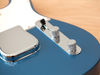 Threaded steel "barrel" bridge saddles; "Top-hat" switch tip and flat-top knurled chrome control knobs