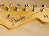 headstock 	Bone nut and single line "Fender Deluxe" vintage-style tuners
