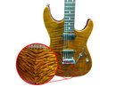 The Devil appears on a Suhr guitar