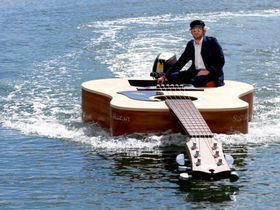 'Guitar Boat' sells for $7k