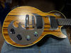From the top Here it is then, one of the most talked-about guitars of recent times. The results of a straw poll in the office indicate that the Dusk Tiger's looks still polarise opinion