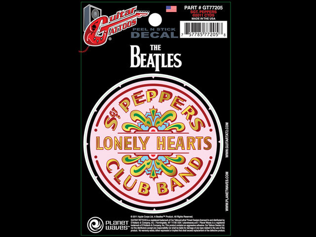 Sgt Pepper's Lonely Hearts Club Band "A replica of the infamous Sgt Pepper's drumhead, this tattoo will make any Beatles fan feel nostalgic."