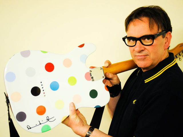 Squeeze's Damien Hirst-designed Fender Telecaster Squueze's Chris Difford show's off the back of his Telecaster