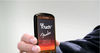 Touched by the hand of God! Eric finally gets to touch his myTouch. Hmm, wooden effect casing…