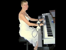 Concert Hands: the strap-in electronic piano teacher