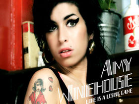 Amy Winehouse has five guitars stolen