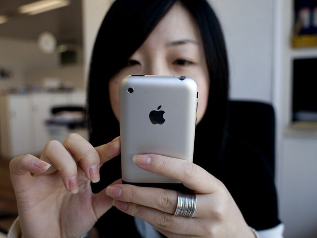 An iPhone user, making an album. Probably.