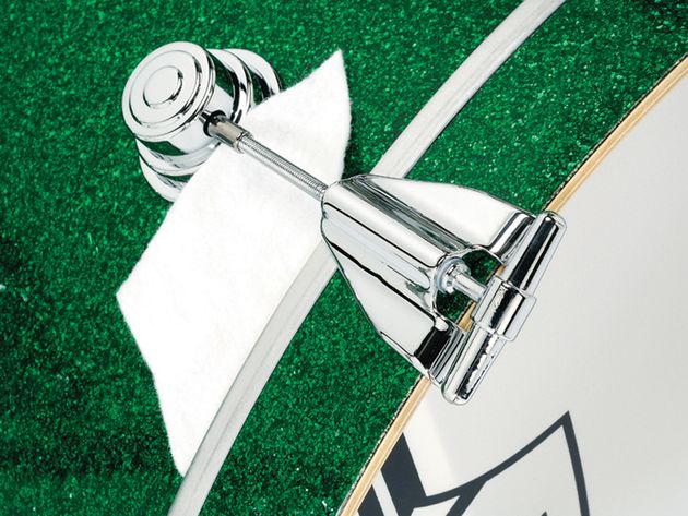 DW Classics Series White coated Ambassador logo bass drum heads and felt strip dampers follow the kit's