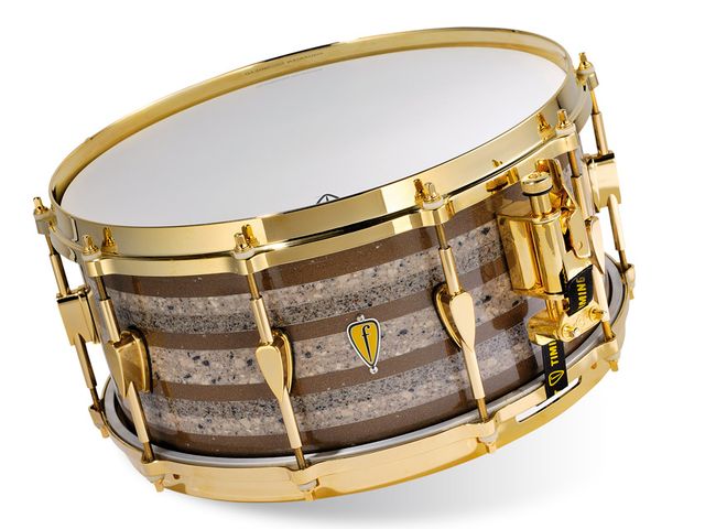 The drums are bonded without any heating or manipulating of the Corian and feel solid and weighty.