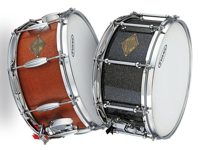 Tiki Snare Drums Tiki's solid beeswing mahogany (left) and maple ply (right) snare drums.