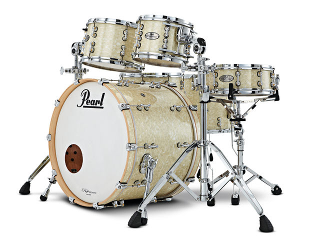 Pearl Reference Pure Series KIt The vintage-style rounded bearing edge on the Pure Series bass drum thickens the attack and emphasises the dark mahogany timbre.