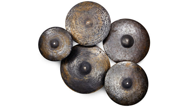 The finish can only be described as raw and a proliferation of hammer marks covers each cymbal, through which smears and splashes of colour