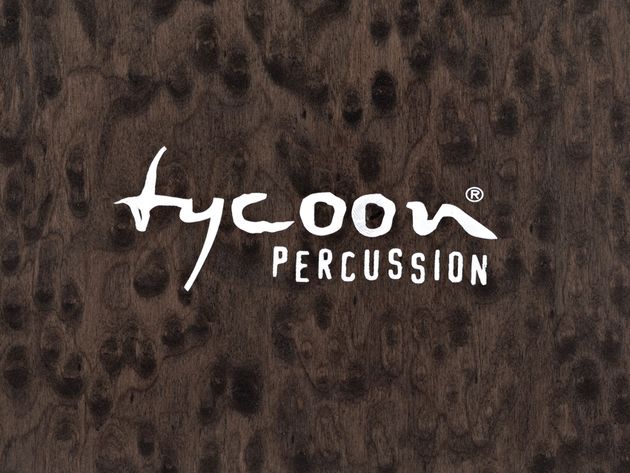 Tycoon Acrylic Cajon The responsive black Makah burl wood frontplate complements the clear surround.