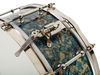 Defiance model snare has eight tube lugs, single-flanged hoops and three-point mount snare strainer.
