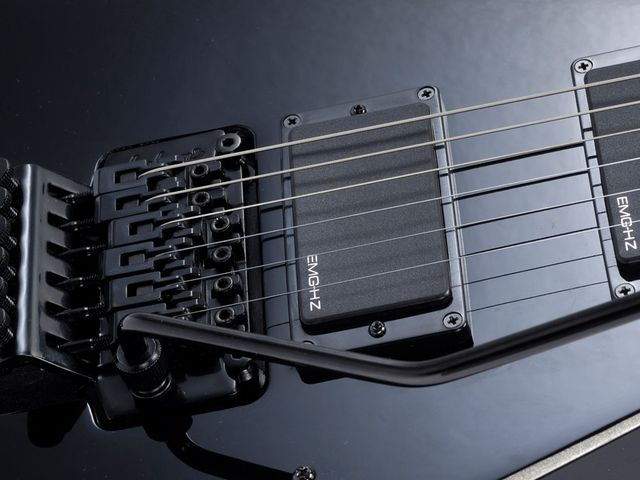 Jackson PDX Demmelition King V The PDX has a licensed vibrato and passive pickups for a low price.