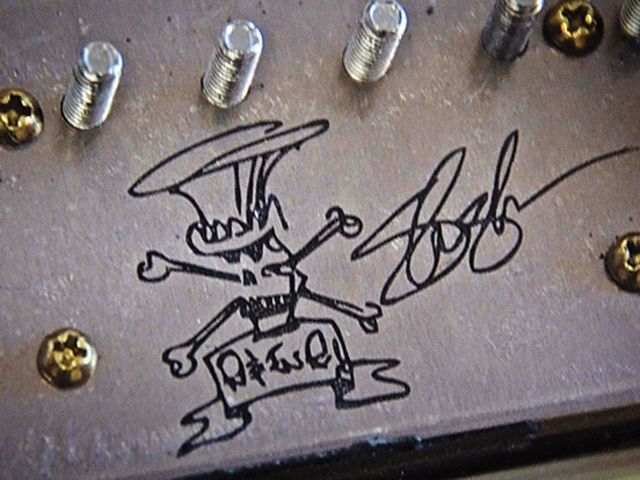 Complete with Slash logo on the base.