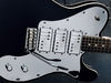 Alder body; bolt-on maple neck; rosewood fingerboard; 25.5" scale; 3 x Enforcer 'Wide Range' humbuckers; volume, tone, 3-way pickup selector; chrome hardware; vibrato, Schaller locking machineheads; black finish