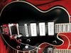 Mahogany body with maple top; mahogany set-in neck; resonator fingerboard; 22 medium frets; 25.5" scale; 3 x Hagstrom P90S singlecoils; volume, tone, rotary pickup selector; chrome hardware; Black Gloss or White Gloss finish